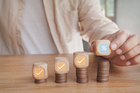 Financial growth concept, stacked coins and wooden blocks showing investment progress, percentage return, wealth building, savings strategy, compound growth, return on investment, financial planning