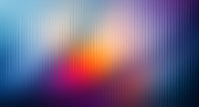 Abstract background featuring a smooth blend of vibrant blue purple and warm orange colors creating a soft ethereal light effect
