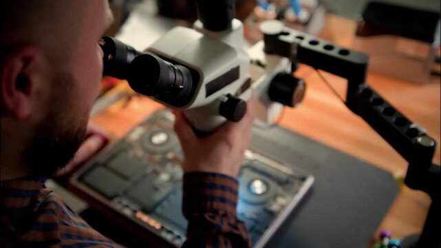 Electronics Inspection with Stereo Microscope and Laptop Circuit Board