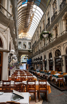 Istanbul, turkey, august 2, 2025 tourists and locals exploring the historic flower passage, an architectural landmark featuring restaurants and cafes under a glass roof