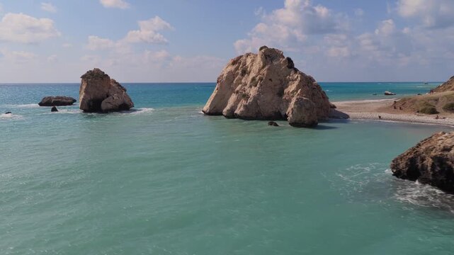 Aerial view of Petra tou Romiou the legendary birthplace of Aphrodite in Cyprus, slow motion.