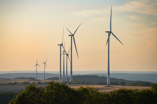 Wind turbine park, agriculture field, sunset, windmills, efficiency renewable sustainable energy, electricity technology, environment conversation