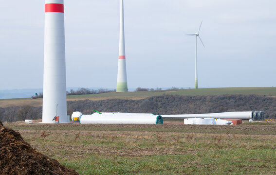 Expansion of renewable sustainable energy, building new wind turbine park, technology, environment and ecosystem in Germany, deforestation of forest