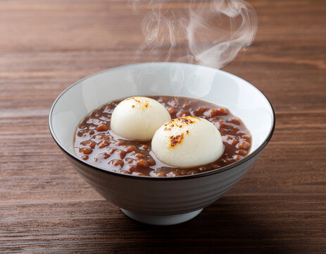 Japanese zenzai sweet red bean soup with grilled mochi rice cakes in a bowl