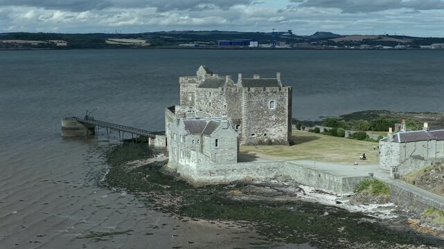 Aerial drone view of Blackness Castle on the Firth of Forth, one of Scotland's best-preserved medieval coastal fortresses.