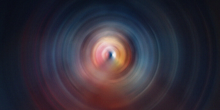 Abstract circular tunnel light vortex motion blur with colorful light streaks and depth.