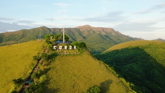 A large Cross in Mount Tapyas Viewdeck, view from drone. Coron, Palawan. Philippines.