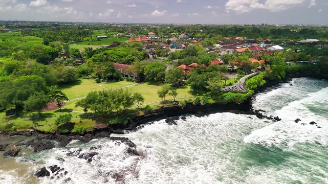 Spectacular aerial view of Tanah Lot temple complex under