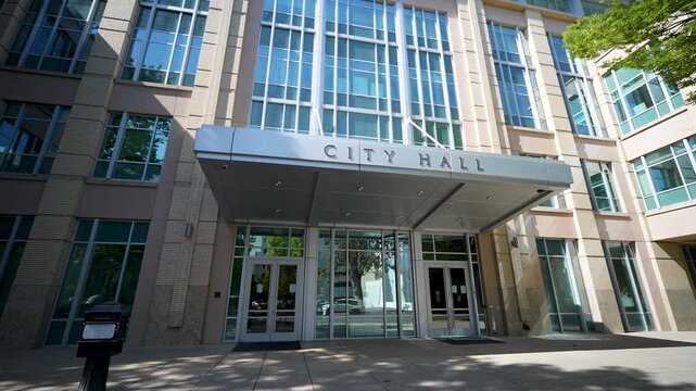 Views show the entrance of old and new City Hall in Sacramento, highlighting the structure and surroundings in daylight.