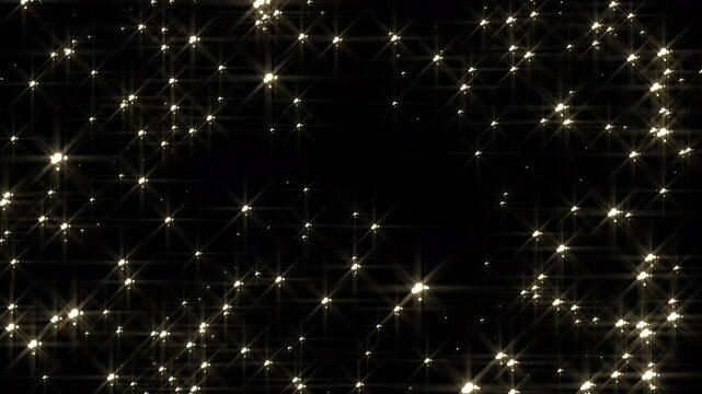 Magical gold star burst animation with sparkling particle explosion, glowing gold star sparkles burst, 2d cartoon doodle sparkle particles, golden glitter sparkle trail black background.4k video