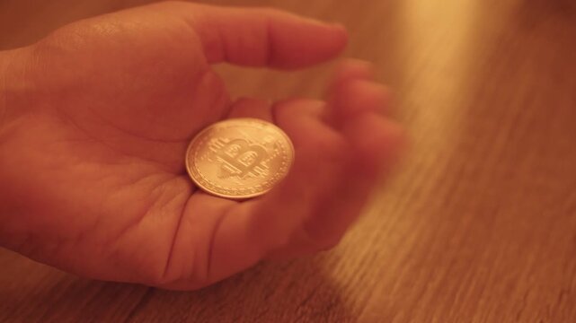 Close-up of US Dollars and Bitcoin Coins