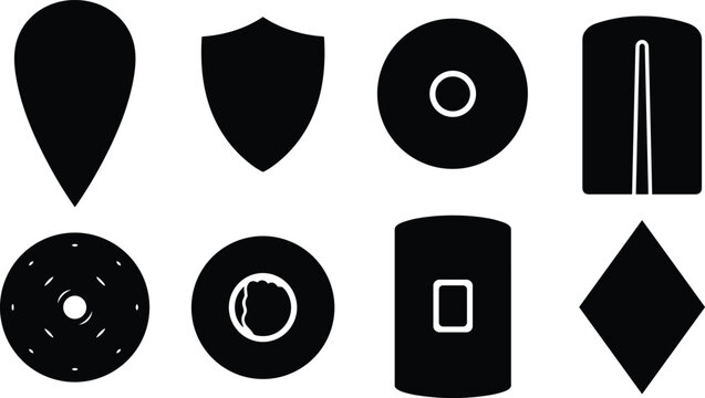 Minimalist black shield silhouette set with diverse shapes for design and heraldry concepts
