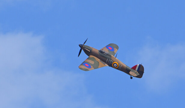  Vintage Hawker Hurricane Mk. I in flight blue sky