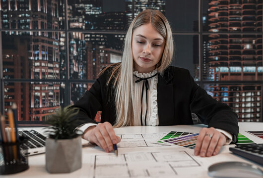 Female architect designer choose best color in spectrum for renovation
