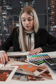 Female architect designer choose best color in spectrum for renovation