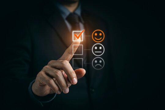 Businessman giving a positive customer experience rating using a digital virtual touch screen