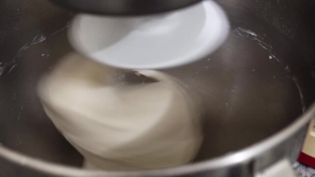 Close Up of Homemade Stand Mixer Kneading Bread Dough During Baking Process