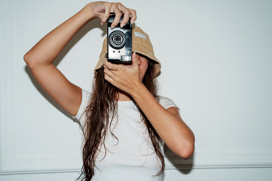 Person Photographing With Point and Shoot Camera