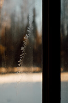 A Pretty Winter Scene Through A Window