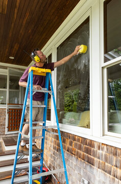 Spring Window Clean man on ladder Headphone 