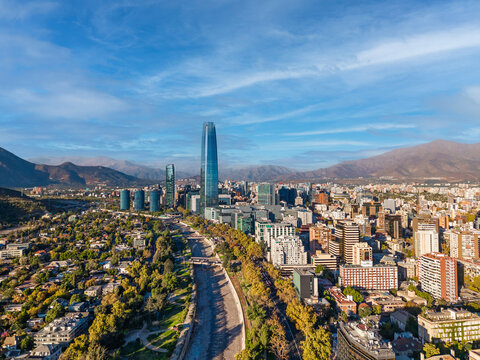 Aerial view of Santiago city skyline with skyscraper and Andes mountains in the background, Chile