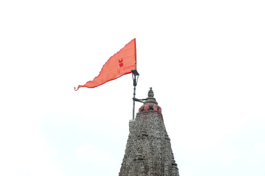 Majestic shikhara of Dwarkadhish Temple with religious flag in Dwarka, Gujarat