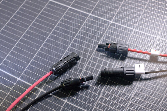 MC4 connectors sitting on a portable solar panel