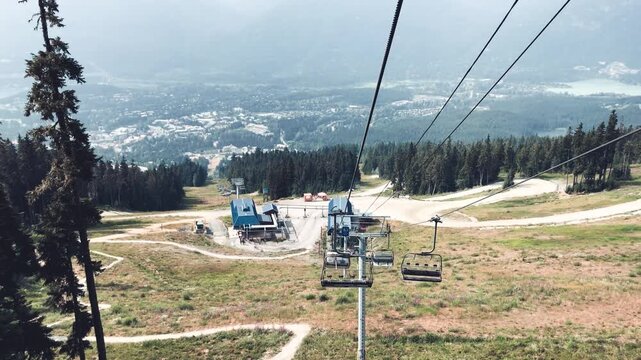 Whistler Chairlift, Blackcomb mountain in British Columbia on a sunny summer day, Canada