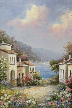 Mediterranean coastal village painting featuring traditional houses, vibrant flowers, and sailboats on blue sea under cloudy sky