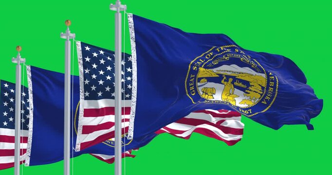 Nebraska state flags waving with the American flag isolated on green background