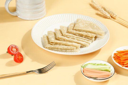 Delicious Buckwheat Pancakes Breakfast with Fresh Vegetables and Wheat Stalks on Beige Background