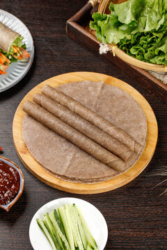 Whole Wheat Tortillas with Fresh Vegetables for Healthy Breakfast Burrito Preparation