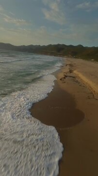 FPV drone flying fast along a beach. Sardinia, Italy