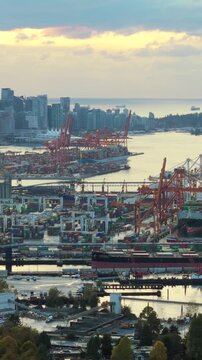 Aerial view of Port of Vancouver, harbour and mountains on the background
