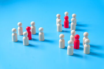 Obraz premium Small group of Wooden figure.Concept of business leadership .