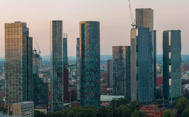 Obraz premium Telephoto Aerial Image of Deansgate Towers Shimmering in Twilight Manchester Sky