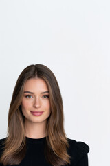 Fototapeta premium young woman corporate headshot with subtle smile, professional female employee portrait for business branding, realistic business woman portrait on white background for marketing