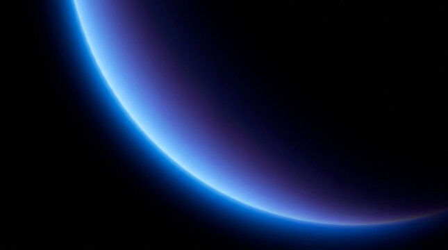 Abstract view of planet earth with blue atmospheric glow and deep shadows in deep outer space.