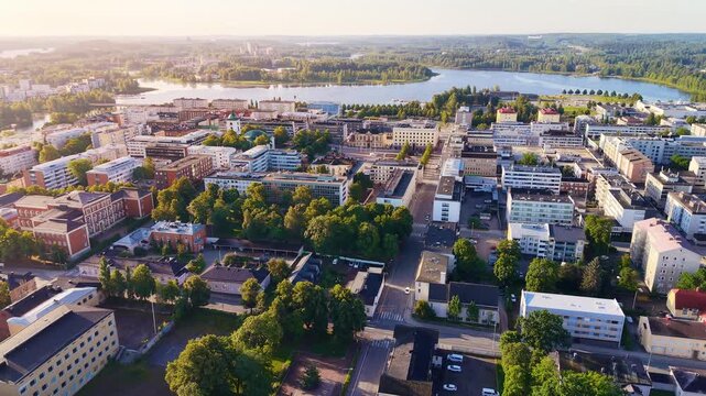 Flyover of a peaceful European town H&auml;meenlinna in Finland. City planning, modern living, tourism and architecture. 