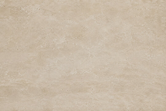 Natural beige stone texture seamless background for architectural surfaces