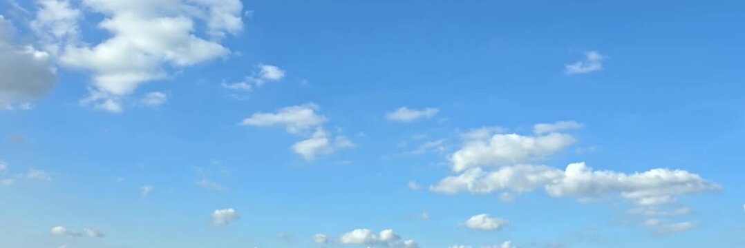 Cloudscape, Timelapse of Wide Panoramic Vivid Blue Sky Background with Small Puffy Clouds for Banner