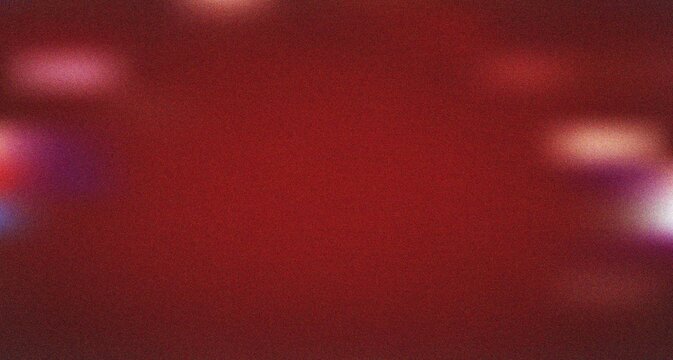 Deep rich red texture with luminous blurs at the edges generating an intense vibrant atmosphere
