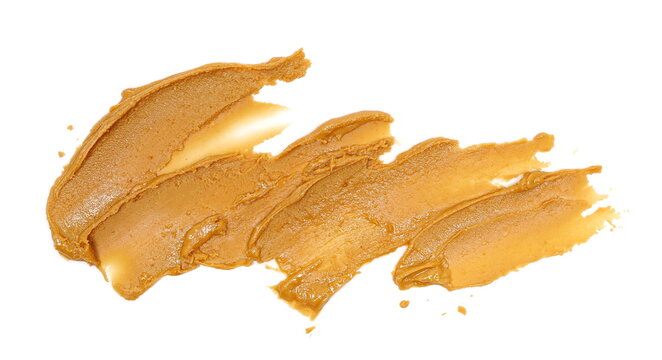 Peanut butter spread isolated on white background, top view