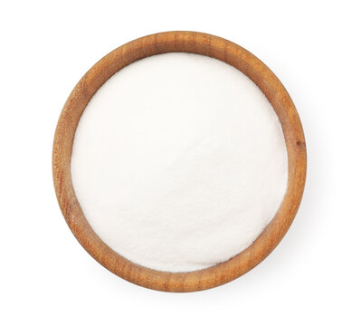 Baking soda in wooden bowl isolated on white, top view