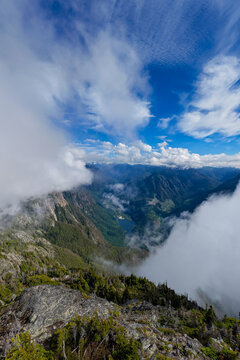 Aerial Mountain View Over Lush Valley and Lake With Dramatic Clouds Near Hope, British Columbia, Canada