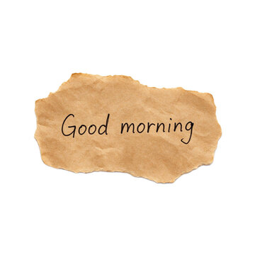 Good morning text written on a piece of torn brown paper as cut out PNG