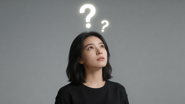 Woman with question marks above head