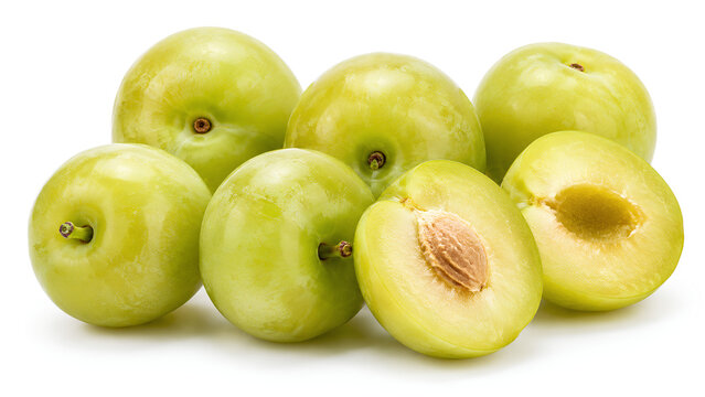 Fresh whole and halved green plums
