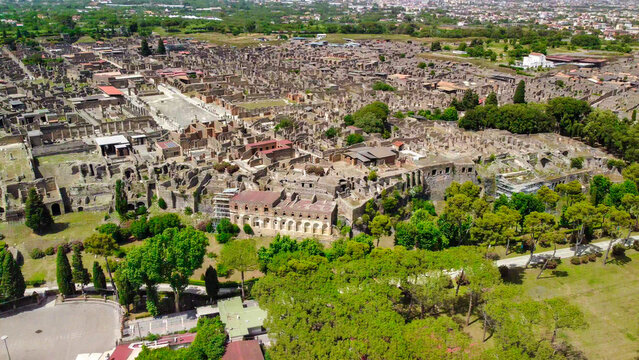 Beautiful aerial view of Pompeii ancient city ruins under clear blue skies