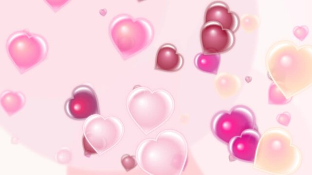Pink glowing heart serum bubbles floating across a soft luxury skincare motion screen.